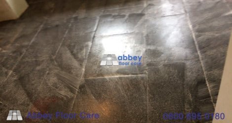 Gel cleaner softening old wax and residue on a riven slate floor