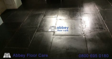 Finished Corris slate kitchen floor with revived colour and retained tooling marks